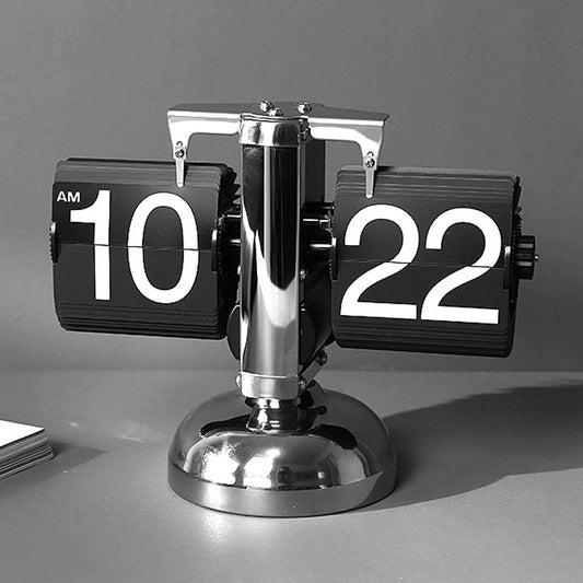 Enhance your home with the Classical Table Clock – a stainless steel and ABS resin masterpiece, radiating timeless luxury in White or Black. Accurate 12-hour AM/PM timekeeping, ±90s/month precision, and easy operation. Elevate your decor with sophistication. 🕰️✨ #TableClock #HomeDecor #LuxuryLiving